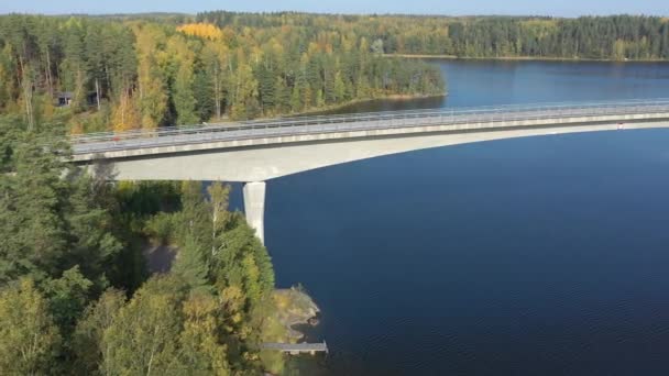 Aerial view of the long bridge across Lake Saimaa in Finland.geology shot.4k — стоковое видео