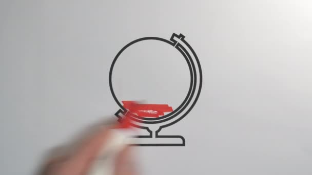A zoom in look of the globe with the red pen — Stockvideo