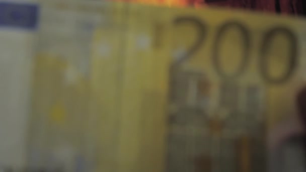 Closer look of the 200 Euro bill on the hands — Stok video