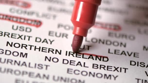 Encircling the word Northern Ireland with the red pen — Αρχείο Βίντεο