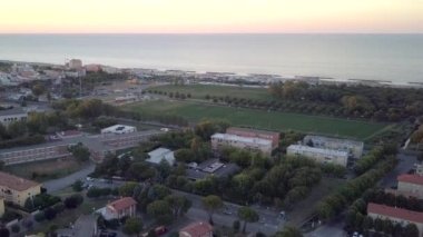 The view of the trees roads and buildings in Rimini Italy