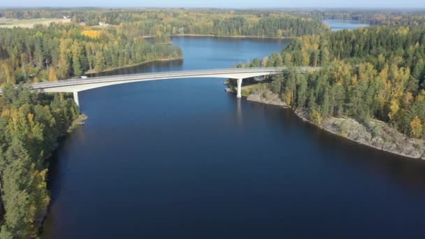 The blue water of the Lake Saimaa in Finland with the long bridge.geology shot. — Stock Video