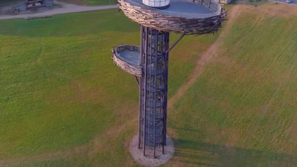 Awesome drone shot of the Nesting Tree lookout tower in Estonia. — Stock Video