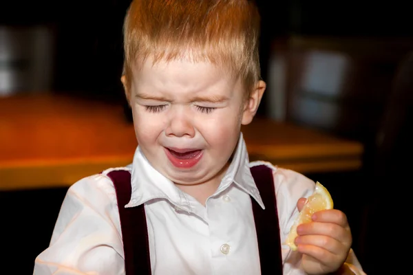 Little Boy Sour Lemon Face — Stock Photo, Image