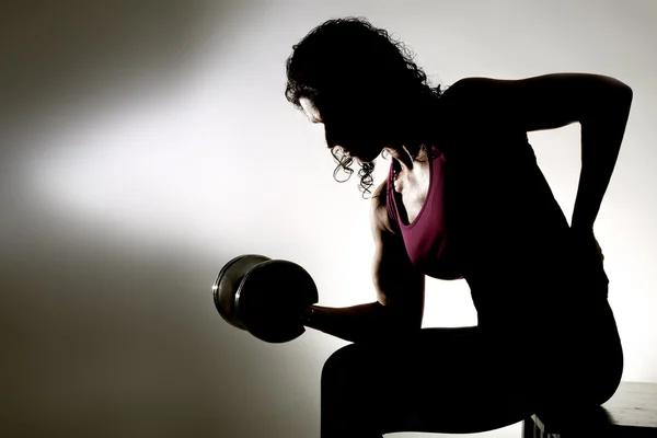 Partial silhouette Trainer Bicep Curls — Stock Photo, Image