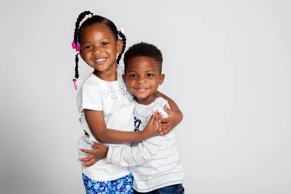 Young African American Siblings Hugging — Stock Photo, Image