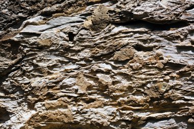 Yıkılmış taş duvarın soyut bir parçası, yüzeysel alan derinliğine dikkat edin.