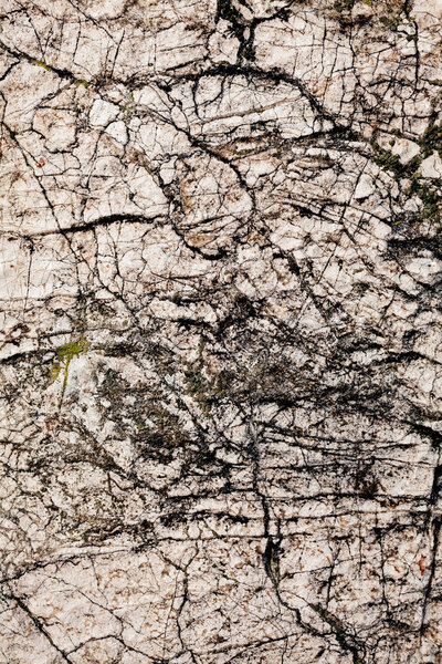 cracked stone wall as background