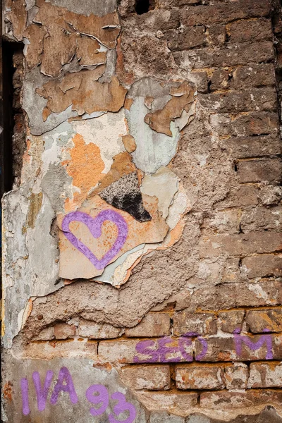 damaged wall with paint residues, note shallow depth of field