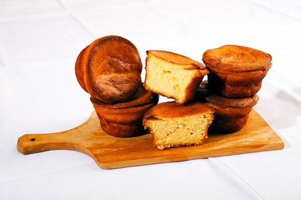 corn bread on a wooden board on the white background
