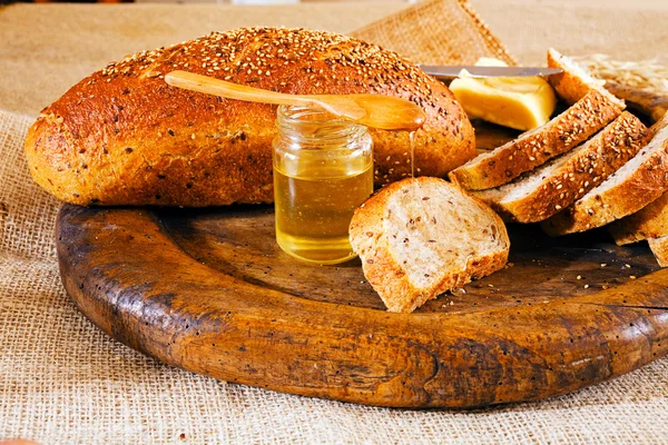 Sliced Integral Bread Butter Jar Honey Wooden Plate — Stock Photo, Image