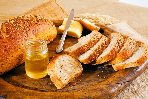 Honey Butter Sliced Black Bread Wooden Board — Stock Photo, Image