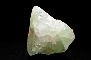green fluorite from Bulgaria on the black background
