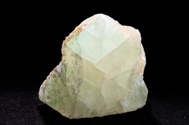 green fluorite from Bulgaria on the black background