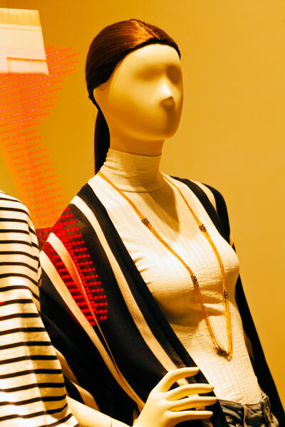 mannequins in a store window