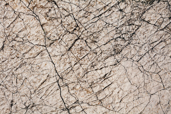 cracked stone wall as background