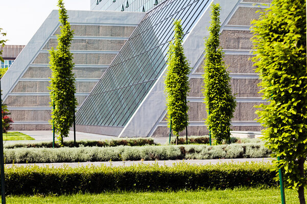 landscaping of the park around the building, note shallow depth of field