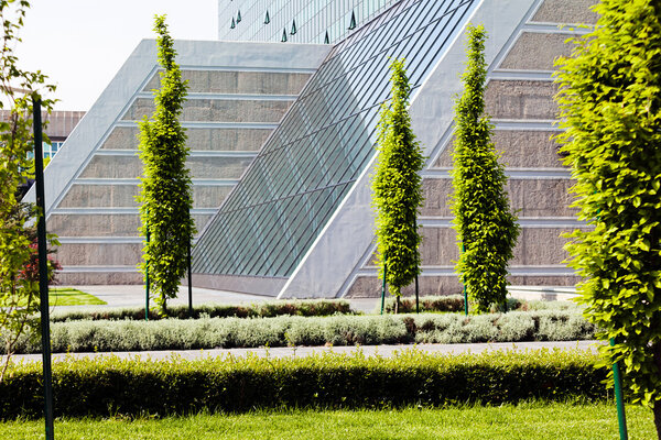 landscaping of the park around the building, note shallow depth of field