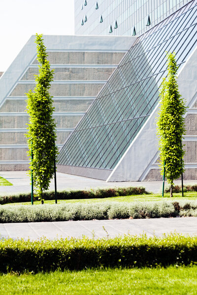 landscaping of the park around the building, note shallow depth of field