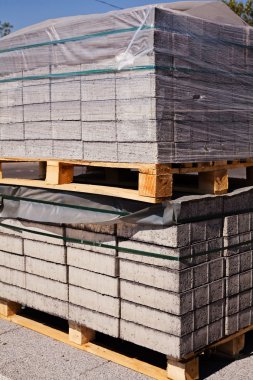 concrete cubes on wooden pallets
