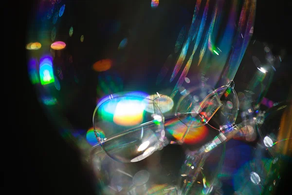 the reflection of light through  bubbles  of soapsuds, for blurred background