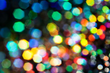 Siyah arkaplanda bulanık arkaplan için daha fazla rengin soyut parlaklığı