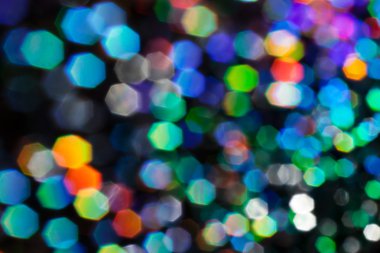 Siyah arkaplanda bulanık arkaplan için daha fazla rengin soyut parlaklığı