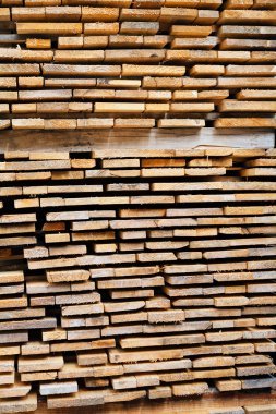 stacked timber on the palette, note shallow depth of field