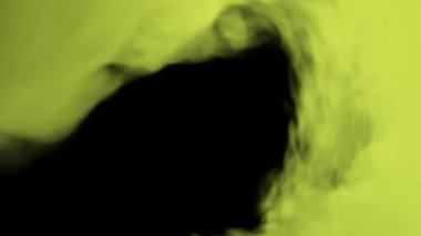 3 boyutlu görüntüleme. Sarı duman siyah bir arkaplanda kıvrılır