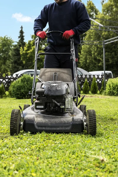 Lawnmower closeup mowing lawn — Stock Photo, Image