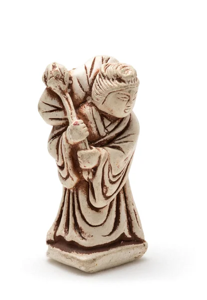 Netsuke van oude vrouw in een badjas. Geïsoleerd — Stockfoto