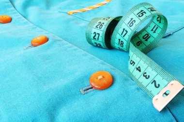 Dikiş aksesuarları. Rulet seamstresses ve turuncu düğmeleri. 