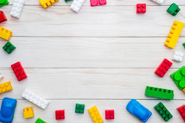 Vue Dessus Briques Jouet Plastique Coloré Sur Fond Bois Blanc — Photo