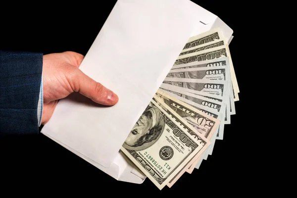 Hand And Money In Envelope On Black Background The Envelope With Cash In Hands Closeup Of Businessman S Hand Holding An Envelope Full Of Money Bribe Paying Stock Photo Hand And Money In Envelope On Black Background The Envelope With Cash In Hands Closeup Of Businessman S Hand Holding An Envelope Full Of Money Bribe Paying Stock Photo