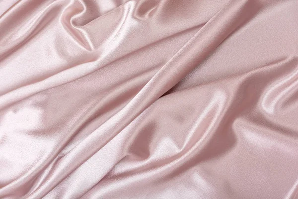 粉红缎子面料纺织背景 粉状的颜色 织物的波纹和褶皱 — 图库照片