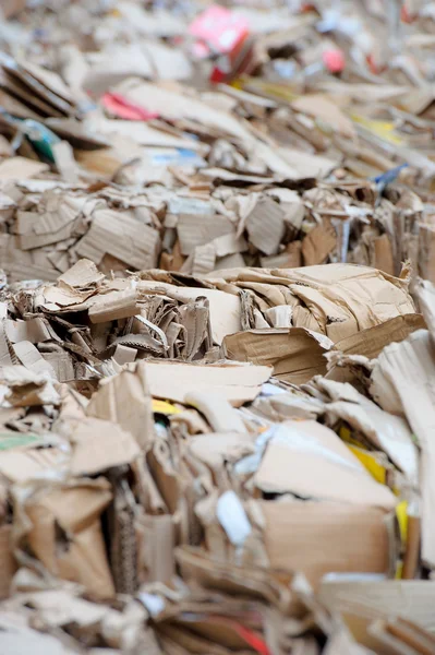 cartons waiting to be picked up by the garbage trucks. recycling