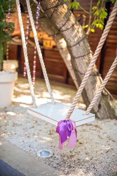 Swing egy lila íj — Stock Fotó