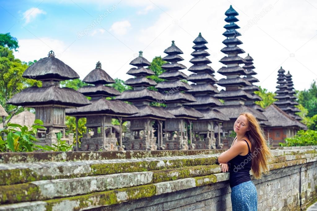The girl on the background of the temple in Bali