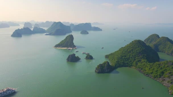 Aerial shot of a Halong Bay national park in Vietnam consisting of thousands of small and big limestone islands. Travel to Vietnam concept — Stock Video