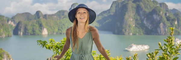 BANNER, LONG FORMAT Attractive woman in a dress is traveling in Halong Bay. Vietnam. Travel to Asia, happiness emotion, summer holiday concept. Picturesque sea landscape. Ha Long Bay, Vietnam