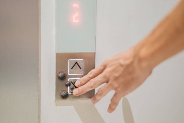 Asansörde parmaklarınla virüse bas. Covid-19 ya da asansör düğmesine Coronavirus. Asansörün ya da asansörün etrafında virüs olan düğme. Enfeksiyon Kontrol ve Sosyal Mesafe Konsepti