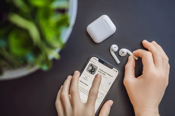 February 23, 2021, USA, New York: Clubhouse audio chat application view on the smartphone IPhone 12 pro. Clubhouse gained incredible popularity in early 2021 — Stock Photo, Image