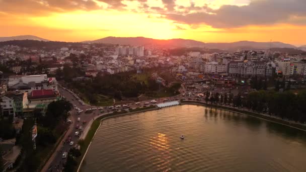 Aerial shot. Sunset in the city of Dalat in the mountain part of a southern Vietnam. Travel to Vietnam concept — Stock Video