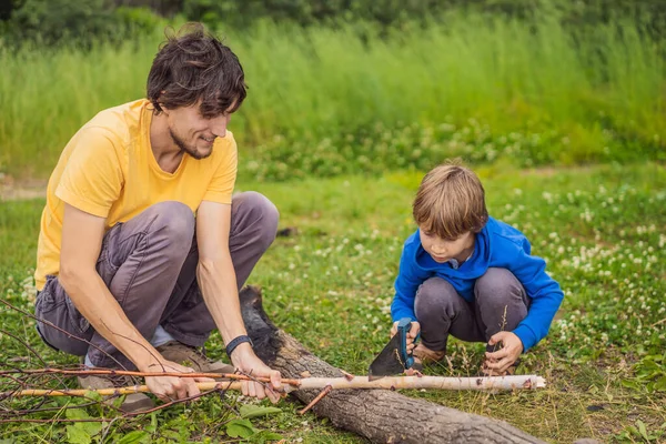 Father and son working with tools outdoor