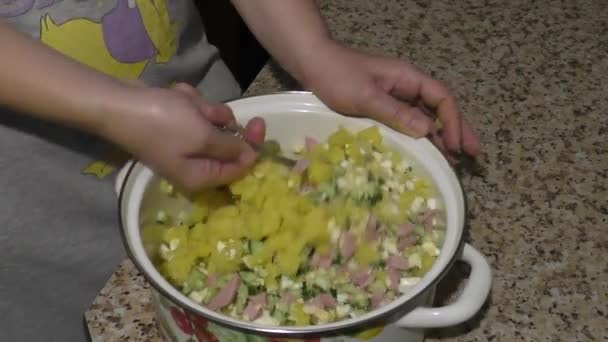 Mixing Olivier Salad in White Bowl Close up — Stock Video