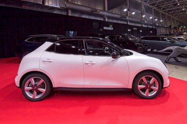 Tartu, Estonia - September 12, 2025: GWM ORA 03 PRO MY 2024 electric car on display at Motoshow 2025, Tartu Messikeskus.