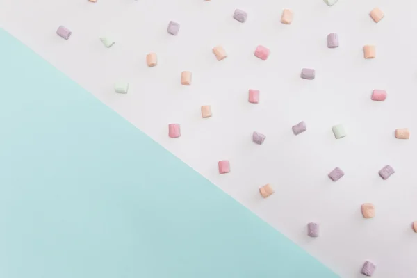 Sweets on pastel backgrounds