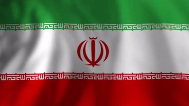 Rüzgarda dalgalanan İran ulusal bayrağı, vatanseverlik sembolünü, kumaş hareketlerini ve ulusal renkleri gösteren birden fazla kusursuz çekimle yakalıyor.