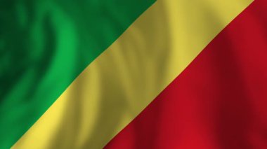 Kongo Cumhuriyeti ulusal bayrağını sallıyor, ulusal gururunu canlı yeşil, sarı ve kırmızı renklerle göstererek, tarafsız arkaplana doğru yavaşça ilerliyor.