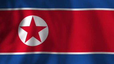 Demokratik Kore Cumhuriyeti 'nin ulusal bayrağı el sallıyor. Gerçekçi ipeksi doku ve nazik kıvrımlar bir vatanseverlik sembolü oluşturur.